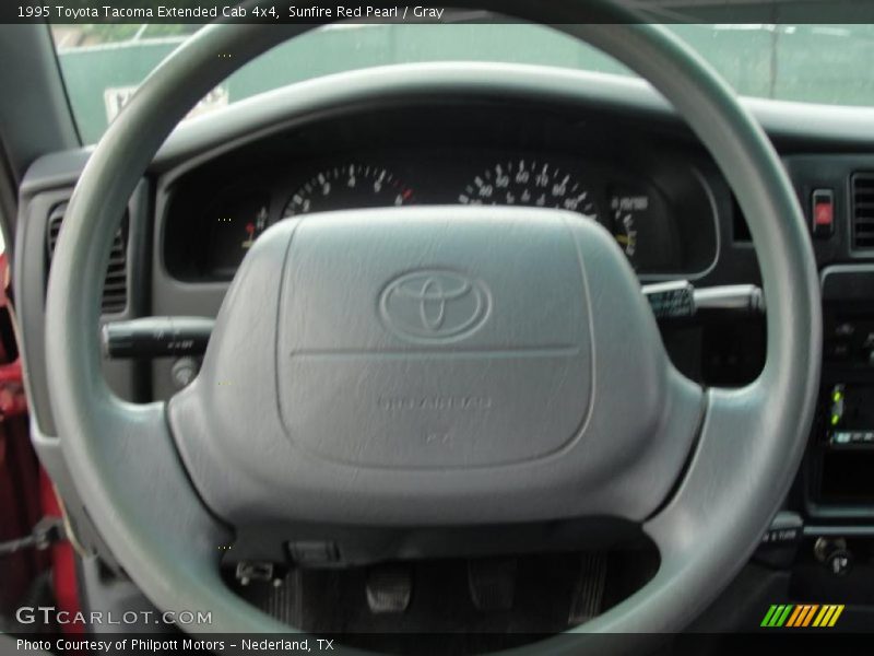 Sunfire Red Pearl / Gray 1995 Toyota Tacoma Extended Cab 4x4