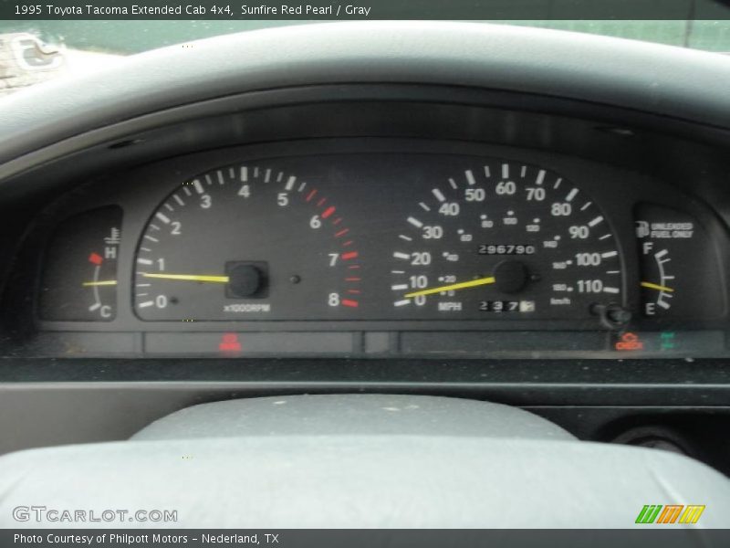 Sunfire Red Pearl / Gray 1995 Toyota Tacoma Extended Cab 4x4