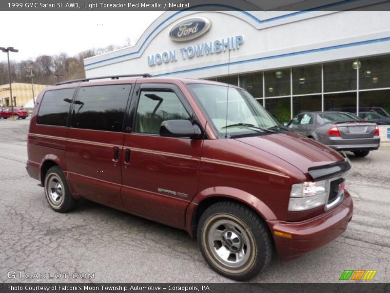 Light Toreador Red Metallic / Neutral 1999 GMC Safari SL AWD