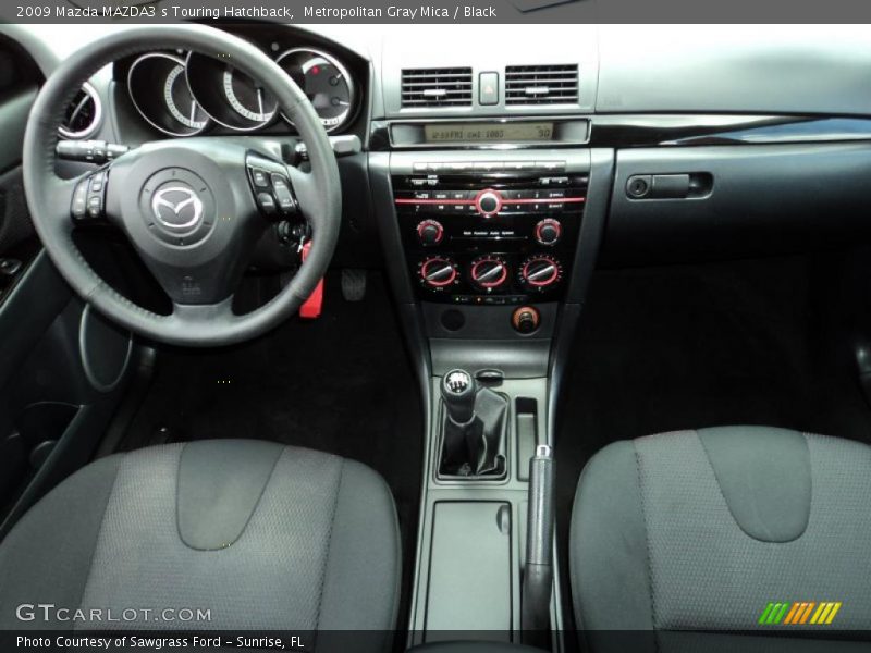 Dashboard of 2009 MAZDA3 s Touring Hatchback