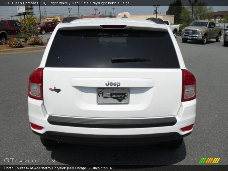 Bright White / Dark Slate Gray/Light Pebble Beige 2011 Jeep Compass 2.4