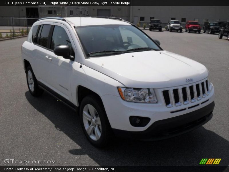 Bright White / Dark Slate Gray/Light Pebble Beige 2011 Jeep Compass 2.4