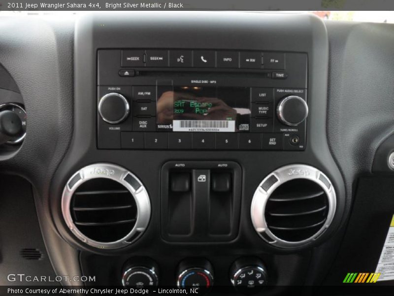 Bright Silver Metallic / Black 2011 Jeep Wrangler Sahara 4x4