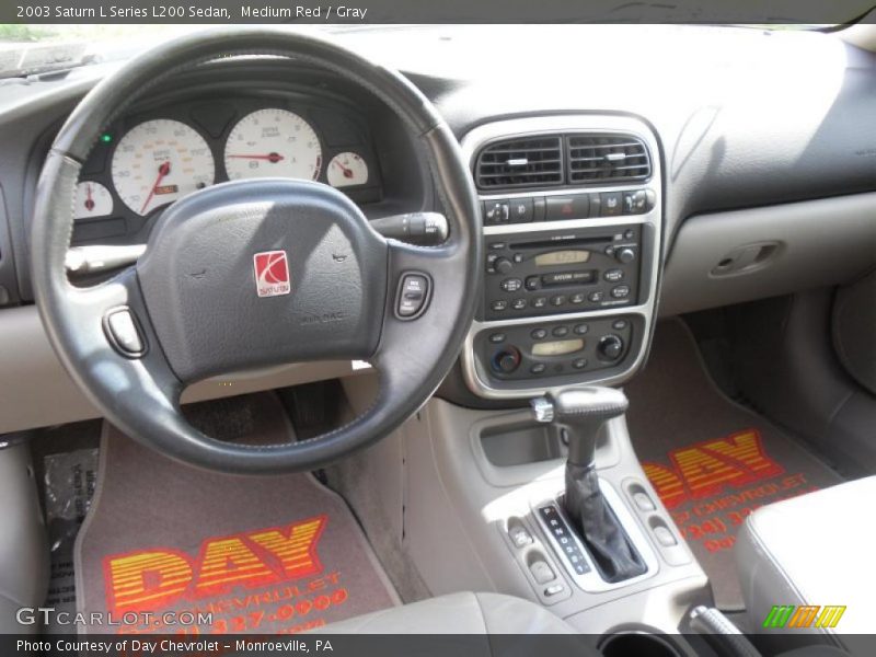 Medium Red / Gray 2003 Saturn L Series L200 Sedan