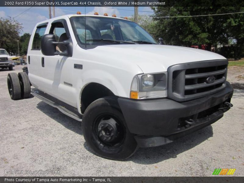 Front 3/4 View of 2002 F350 Super Duty XL SuperCab 4x4 Chassis