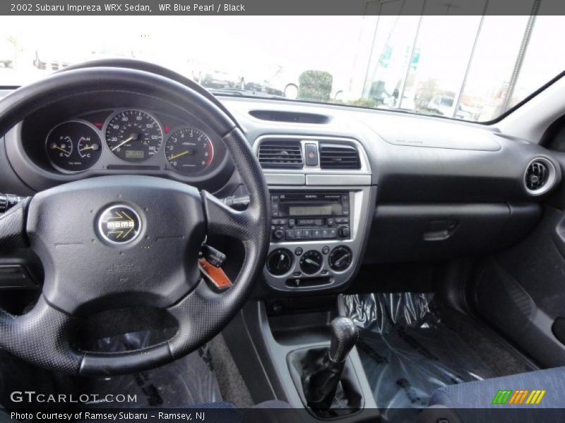 WR Blue Pearl / Black 2002 Subaru Impreza WRX Sedan