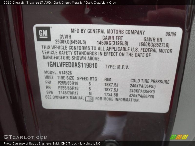 Dark Cherry Metallic / Dark Gray/Light Gray 2010 Chevrolet Traverse LT AWD