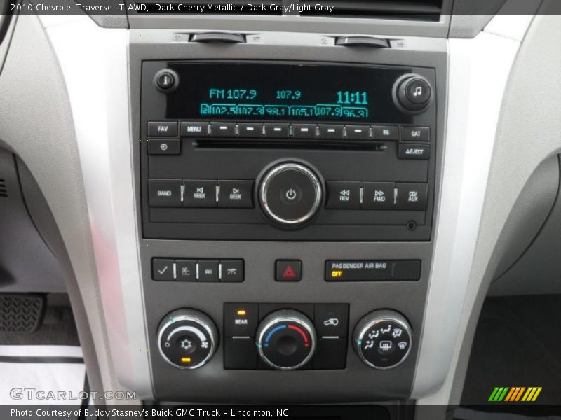 Dark Cherry Metallic / Dark Gray/Light Gray 2010 Chevrolet Traverse LT AWD