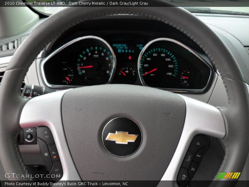 Dark Cherry Metallic / Dark Gray/Light Gray 2010 Chevrolet Traverse LT AWD