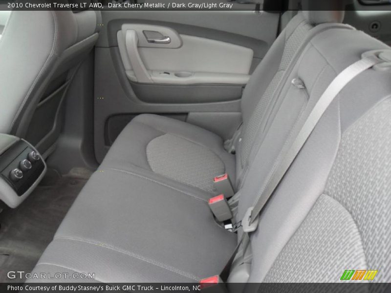 Dark Cherry Metallic / Dark Gray/Light Gray 2010 Chevrolet Traverse LT AWD