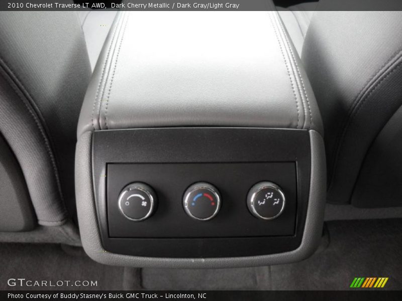Dark Cherry Metallic / Dark Gray/Light Gray 2010 Chevrolet Traverse LT AWD
