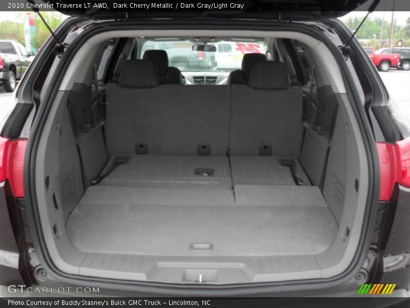 Dark Cherry Metallic / Dark Gray/Light Gray 2010 Chevrolet Traverse LT AWD