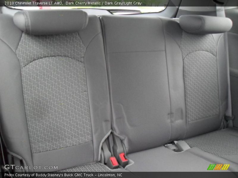 Dark Cherry Metallic / Dark Gray/Light Gray 2010 Chevrolet Traverse LT AWD