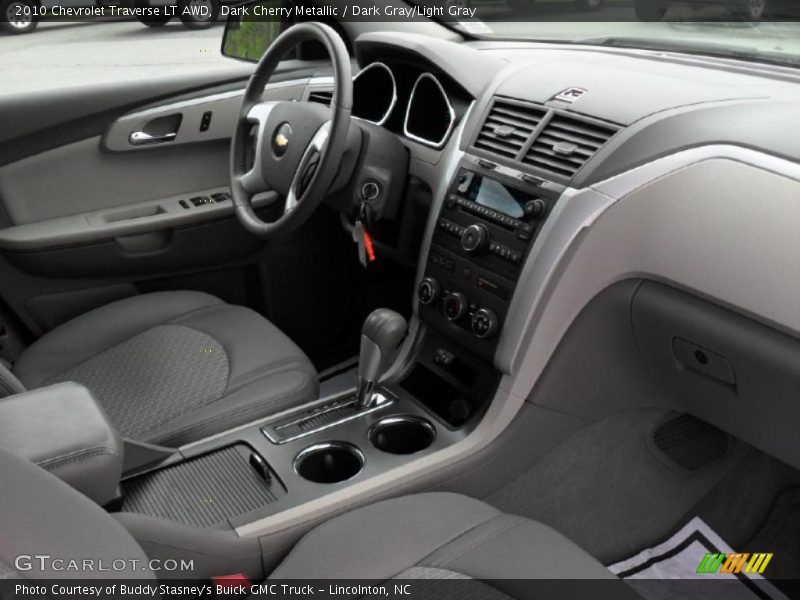 Dark Cherry Metallic / Dark Gray/Light Gray 2010 Chevrolet Traverse LT AWD