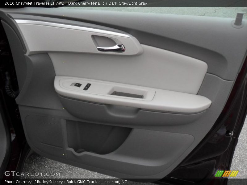 Dark Cherry Metallic / Dark Gray/Light Gray 2010 Chevrolet Traverse LT AWD