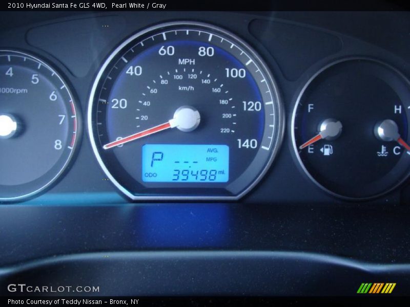 Pearl White / Gray 2010 Hyundai Santa Fe GLS 4WD