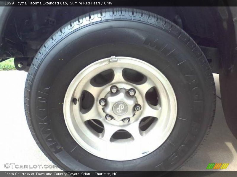 Sunfire Red Pearl / Gray 1999 Toyota Tacoma Extended Cab