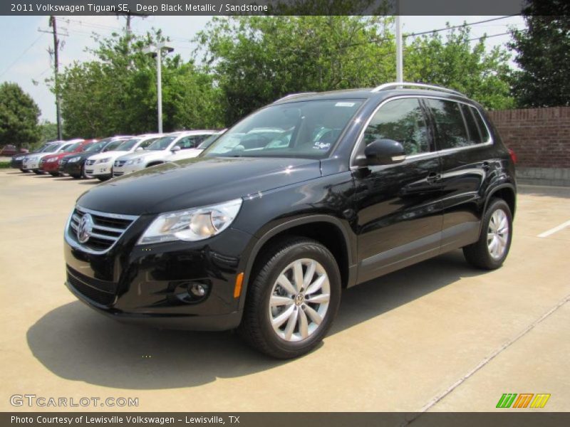 Deep Black Metallic / Sandstone 2011 Volkswagen Tiguan SE