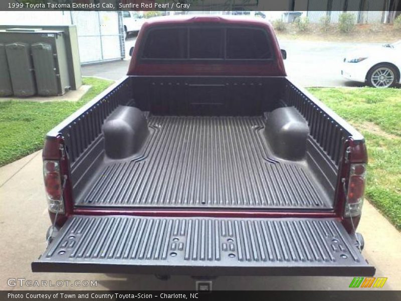 Sunfire Red Pearl / Gray 1999 Toyota Tacoma Extended Cab