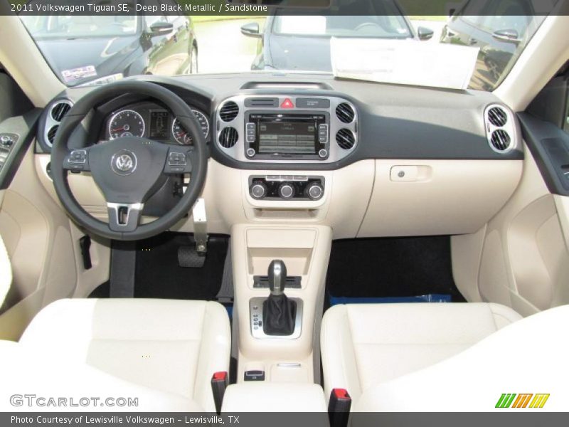 Deep Black Metallic / Sandstone 2011 Volkswagen Tiguan SE