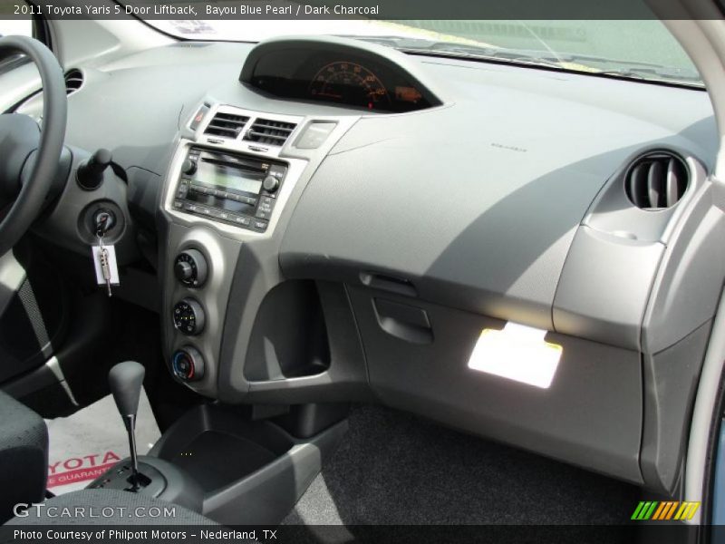 Bayou Blue Pearl / Dark Charcoal 2011 Toyota Yaris 5 Door Liftback