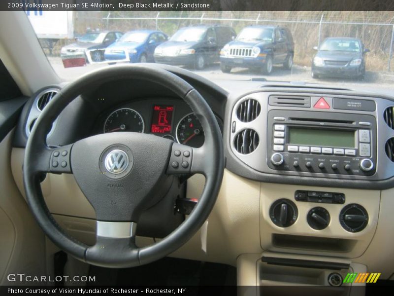 Deep Black Metallic / Sandstone 2009 Volkswagen Tiguan SE 4Motion