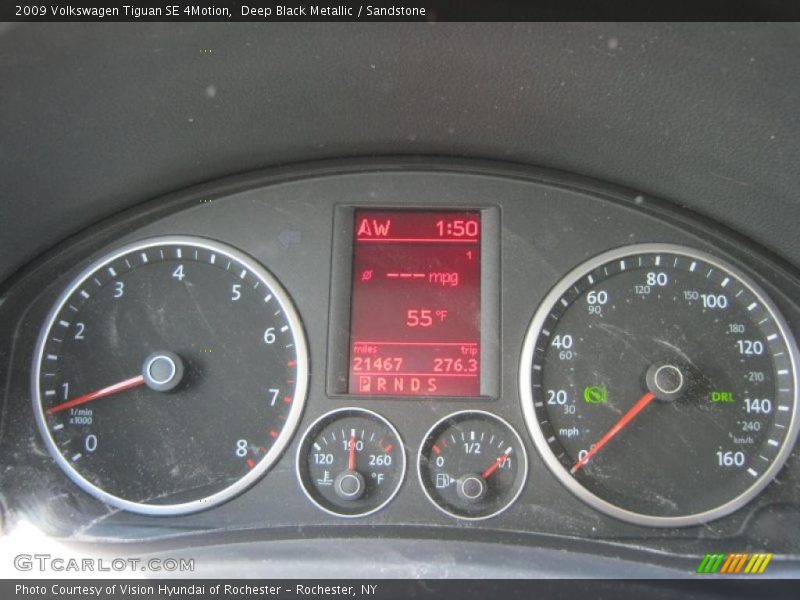 Deep Black Metallic / Sandstone 2009 Volkswagen Tiguan SE 4Motion
