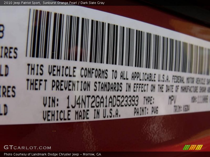 Sunburst Orange Pearl / Dark Slate Gray 2010 Jeep Patriot Sport
