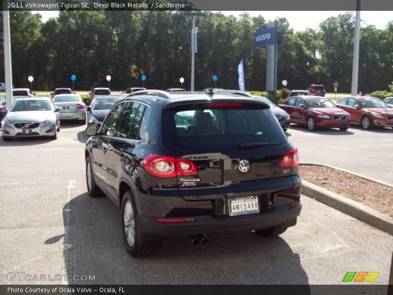 Deep Black Metallic / Sandstone 2011 Volkswagen Tiguan SE