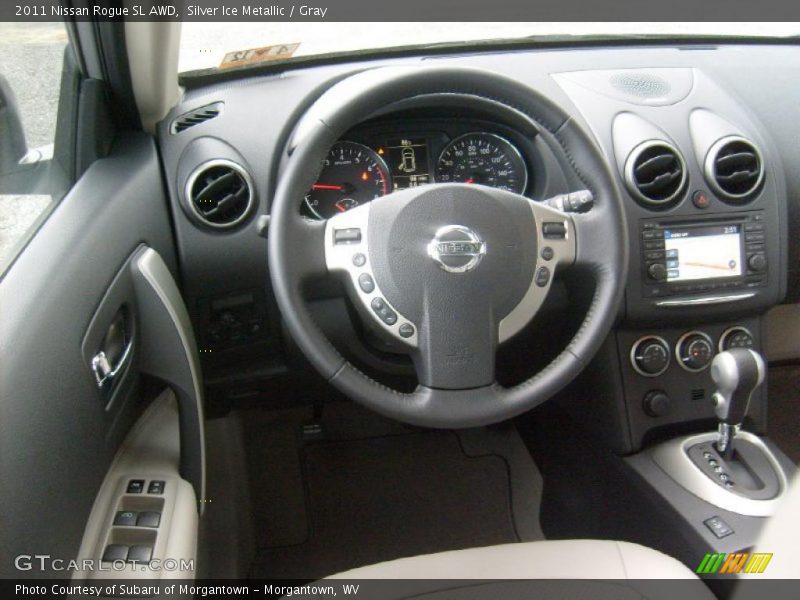 Silver Ice Metallic / Gray 2011 Nissan Rogue SL AWD