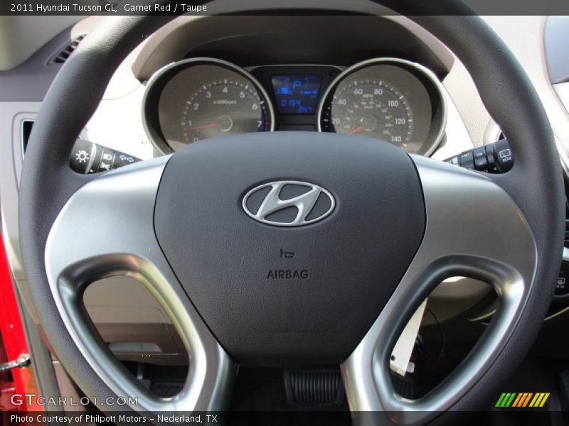 Garnet Red / Taupe 2011 Hyundai Tucson GL