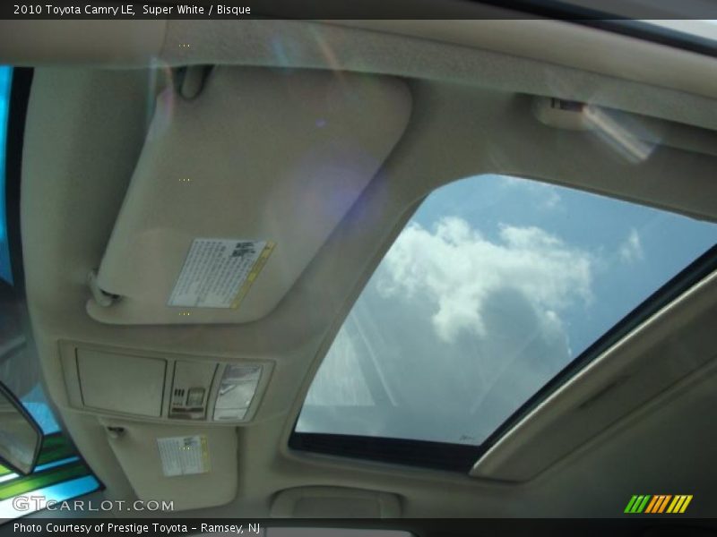 Super White / Bisque 2010 Toyota Camry LE