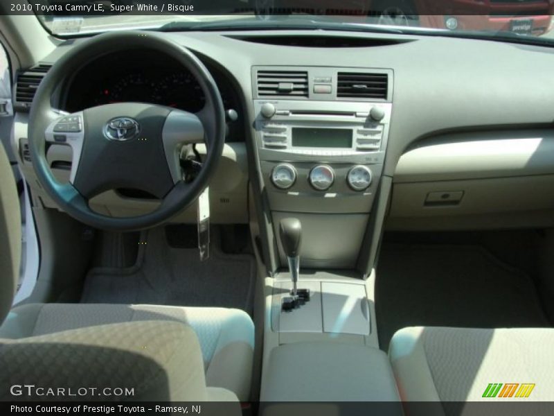 Super White / Bisque 2010 Toyota Camry LE