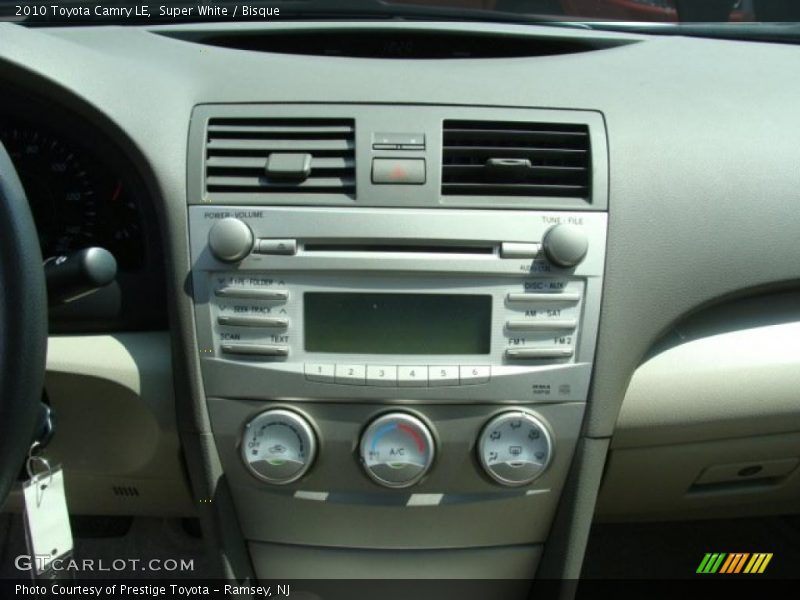 Super White / Bisque 2010 Toyota Camry LE