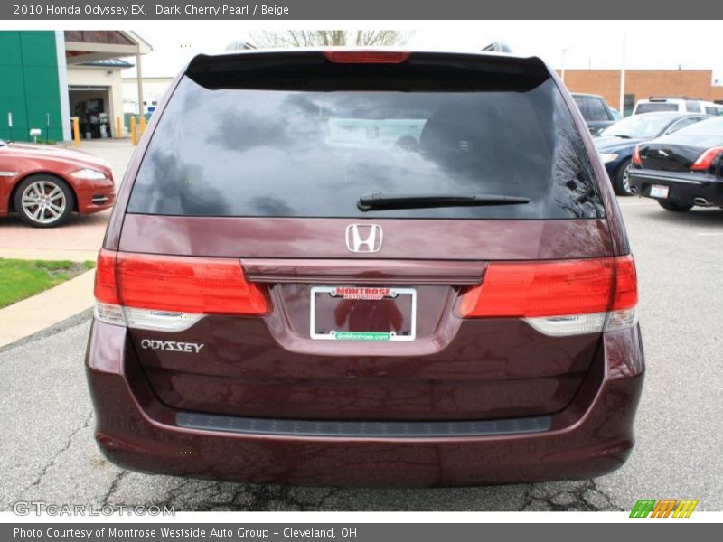 Dark Cherry Pearl / Beige 2010 Honda Odyssey EX
