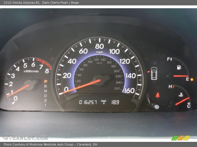 Dark Cherry Pearl / Beige 2010 Honda Odyssey EX