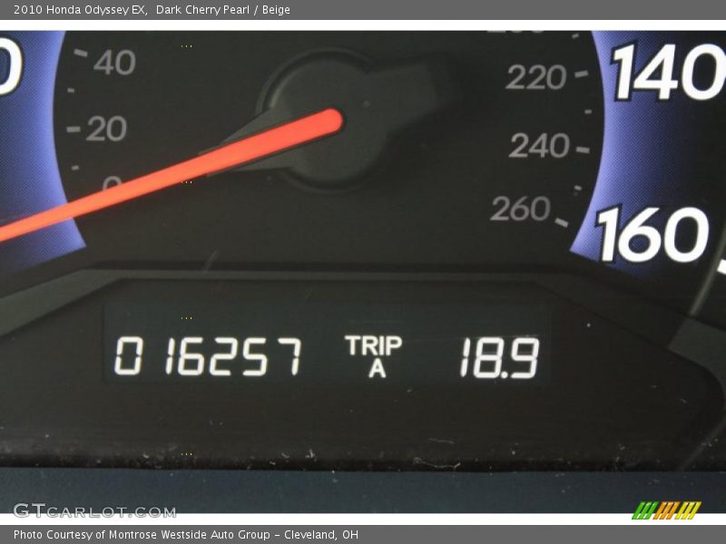 Dark Cherry Pearl / Beige 2010 Honda Odyssey EX