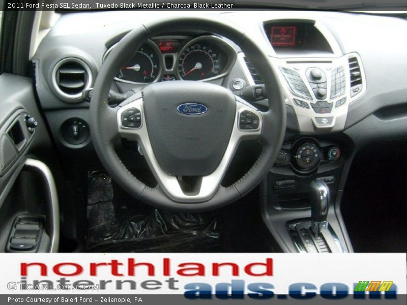Tuxedo Black Metallic / Charcoal Black Leather 2011 Ford Fiesta SEL Sedan