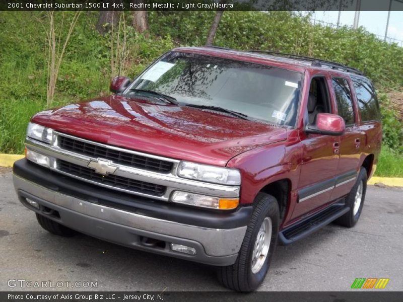 Redfire Metallic / Light Gray/Neutral 2001 Chevrolet Suburban 1500 LT 4x4