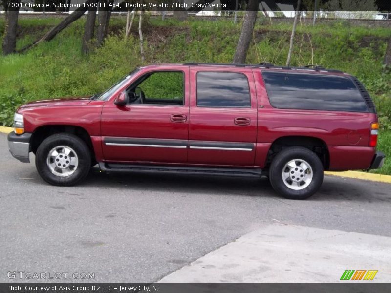 Redfire Metallic / Light Gray/Neutral 2001 Chevrolet Suburban 1500 LT 4x4