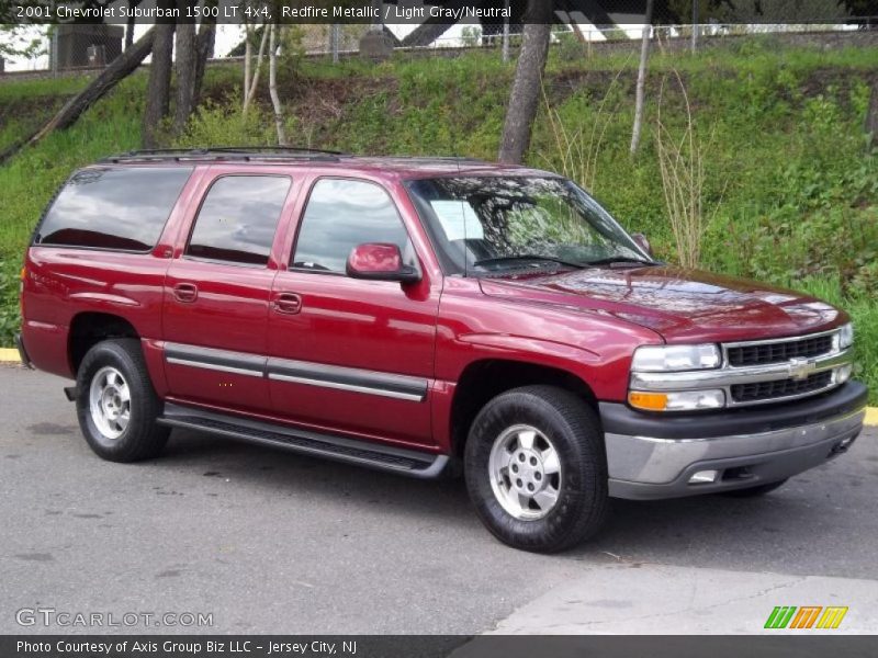 Redfire Metallic / Light Gray/Neutral 2001 Chevrolet Suburban 1500 LT 4x4