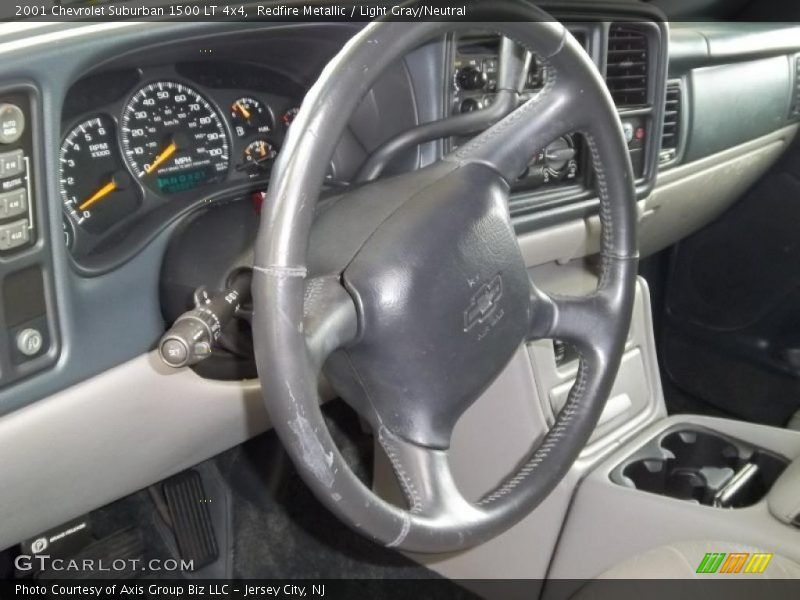 Redfire Metallic / Light Gray/Neutral 2001 Chevrolet Suburban 1500 LT 4x4