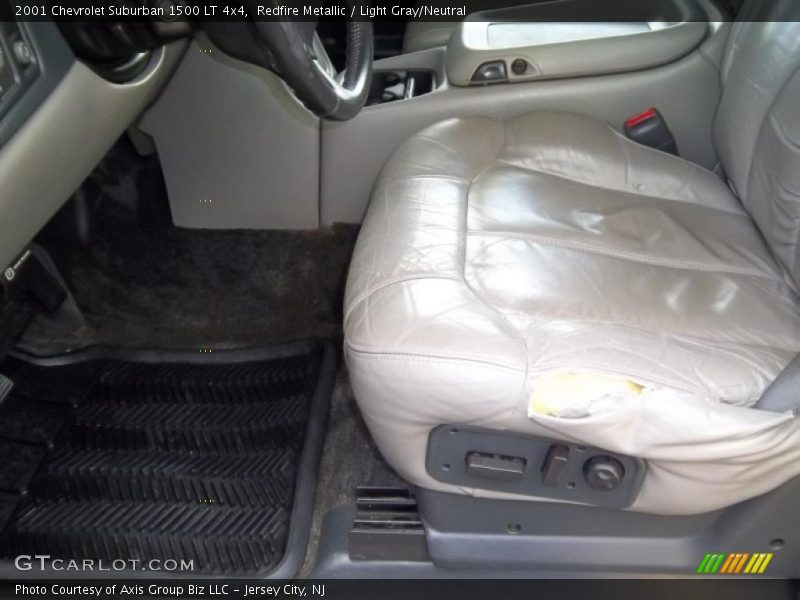Redfire Metallic / Light Gray/Neutral 2001 Chevrolet Suburban 1500 LT 4x4