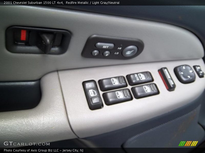 Redfire Metallic / Light Gray/Neutral 2001 Chevrolet Suburban 1500 LT 4x4