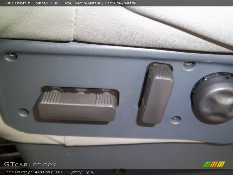 Redfire Metallic / Light Gray/Neutral 2001 Chevrolet Suburban 1500 LT 4x4