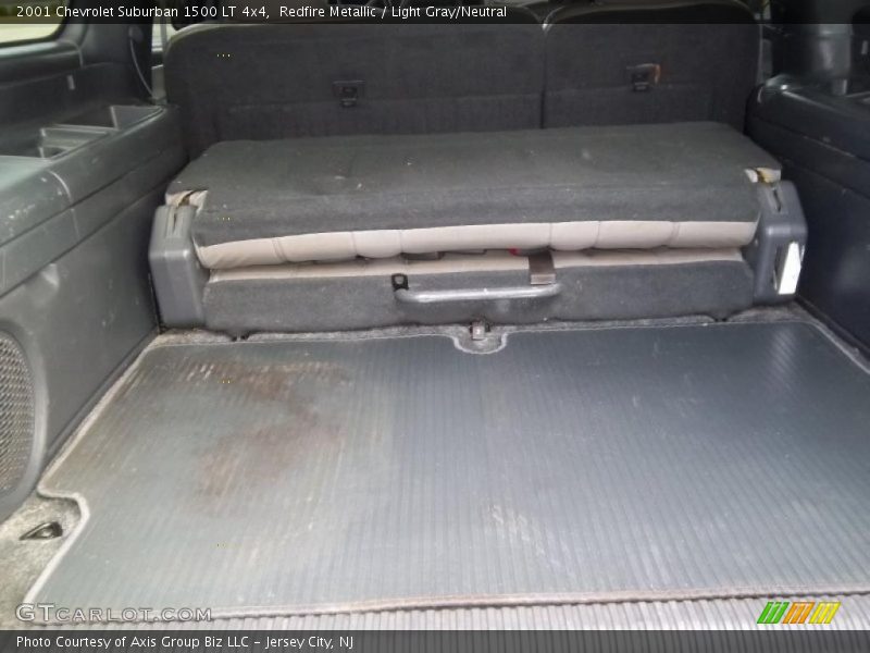 Redfire Metallic / Light Gray/Neutral 2001 Chevrolet Suburban 1500 LT 4x4