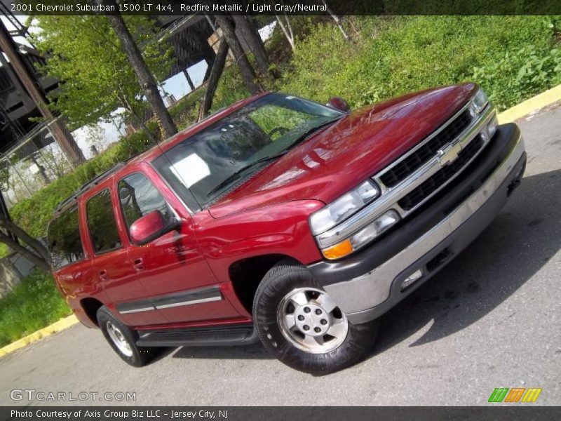 Redfire Metallic / Light Gray/Neutral 2001 Chevrolet Suburban 1500 LT 4x4