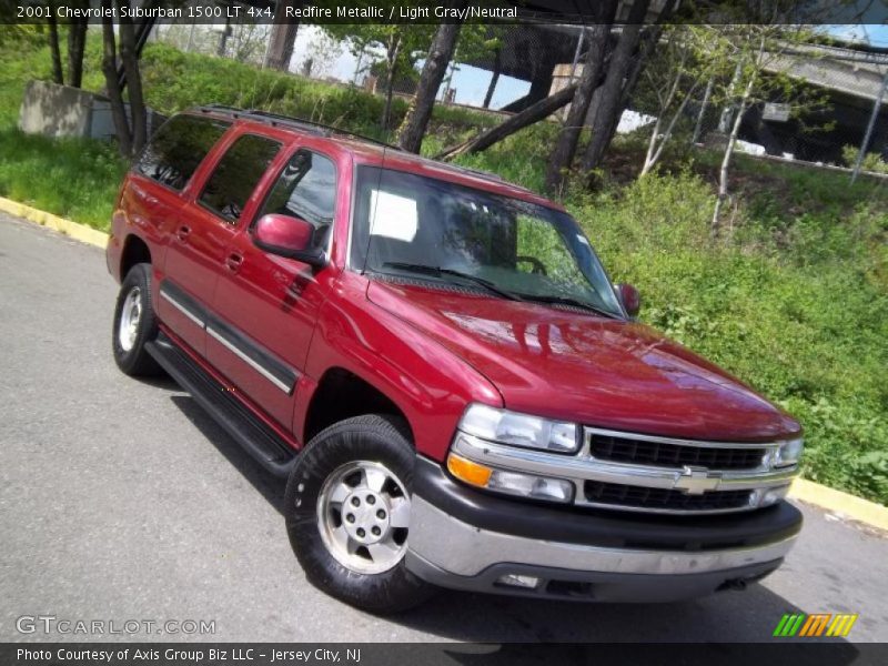 Redfire Metallic / Light Gray/Neutral 2001 Chevrolet Suburban 1500 LT 4x4