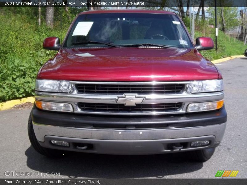 Redfire Metallic / Light Gray/Neutral 2001 Chevrolet Suburban 1500 LT 4x4