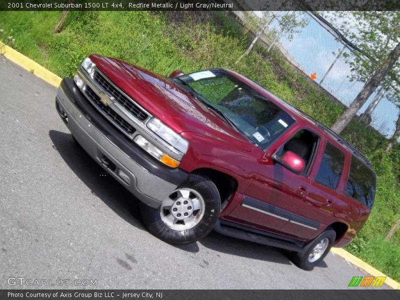 Redfire Metallic / Light Gray/Neutral 2001 Chevrolet Suburban 1500 LT 4x4